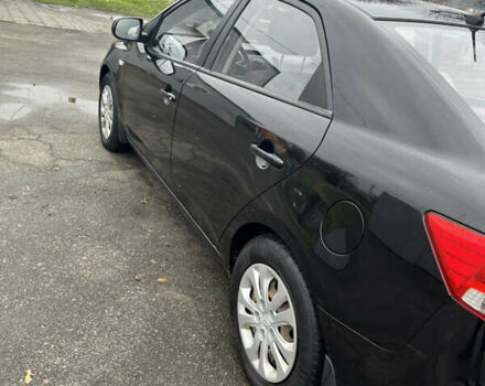 Чорний Кіа Черато, об'ємом двигуна 1.59 л та пробігом 170 тис. км за 7450 $, фото 4 на Automoto.ua