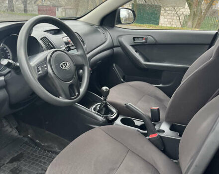 Чорний Кіа Черато, об'ємом двигуна 1.59 л та пробігом 170 тис. км за 7450 $, фото 6 на Automoto.ua