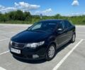 Черный Киа Черато, объемом двигателя 1.59 л и пробегом 231 тыс. км за 8300 $, фото 1 на Automoto.ua