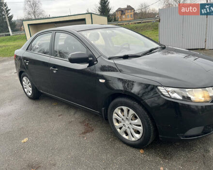 Чорний Кіа Черато, об'ємом двигуна 1.59 л та пробігом 170 тис. км за 7450 $, фото 2 на Automoto.ua