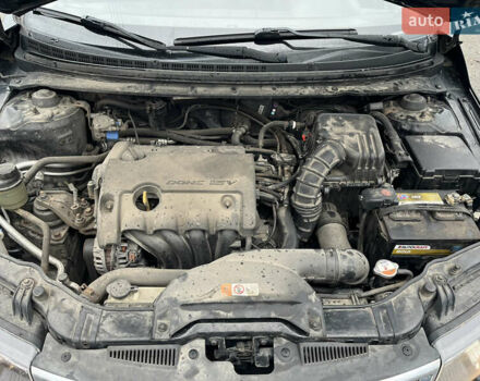 Чорний Кіа Черато, об'ємом двигуна 1.59 л та пробігом 170 тис. км за 7450 $, фото 13 на Automoto.ua