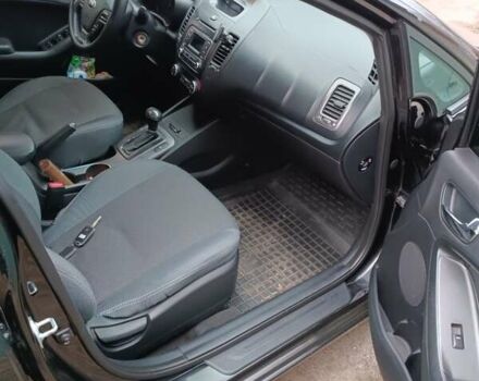 Черный Киа Черато, объемом двигателя 1.6 л и пробегом 139 тыс. км за 8600 $, фото 2 на Automoto.ua