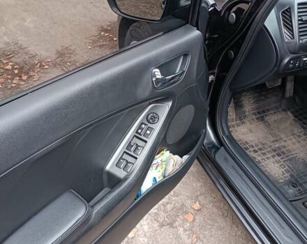 Черный Киа Черато, объемом двигателя 1.59 л и пробегом 139 тыс. км за 8600 $, фото 5 на Automoto.ua