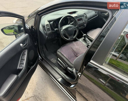 Чорний Кіа Черато, об'ємом двигуна 1.59 л та пробігом 130 тис. км за 8900 $, фото 11 на Automoto.ua