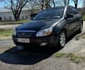 Черный Киа Черато, объемом двигателя 1.6 л и пробегом 224 тыс. км за 4000 $, фото 1 на Automoto.ua