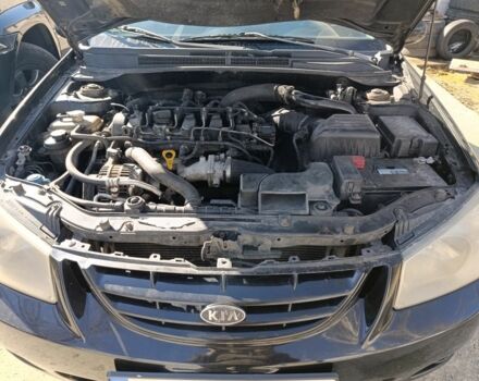 Черный Киа Черато, объемом двигателя 2 л и пробегом 345 тыс. км за 3800 $, фото 1 на Automoto.ua