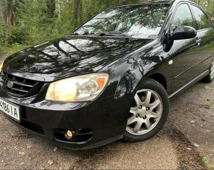 Чорний Кіа Черато, об'ємом двигуна 2 л та пробігом 207 тис. км за 4999 $, фото 1 на Automoto.ua