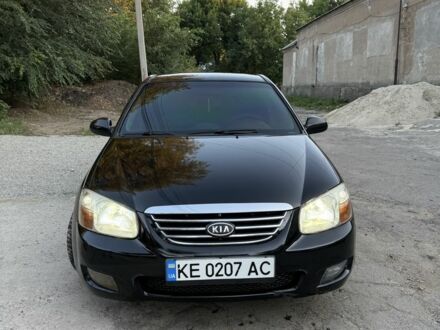 Черный Киа Черато, объемом двигателя 1.6 л и пробегом 286 тыс. км за 3500 $, фото 1 на Automoto.ua