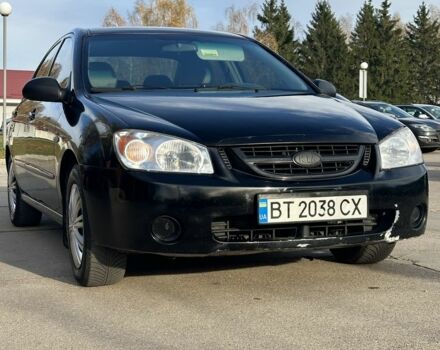 Черный Киа Черато, объемом двигателя 1.6 л и пробегом 245 тыс. км за 2850 $, фото 1 на Automoto.ua