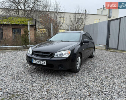 Черный Киа Черато, объемом двигателя 1.6 л и пробегом 220 тыс. км за 3300 $, фото 1 на Automoto.ua