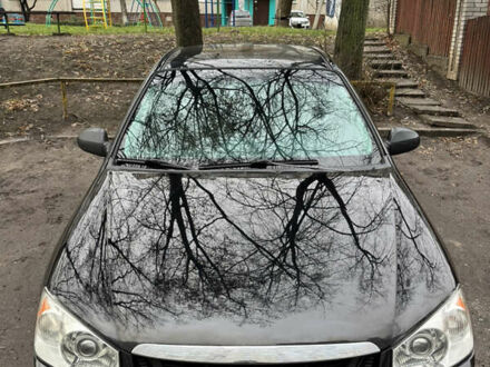 Черный Киа Черато, объемом двигателя 1.6 л и пробегом 312 тыс. км за 4100 $, фото 1 на Automoto.ua