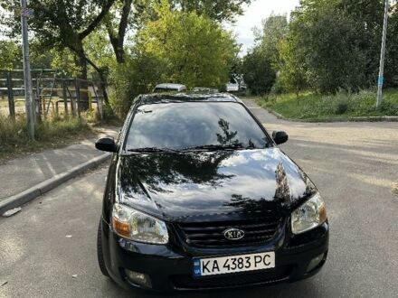 Чорний Кіа Черато, об'ємом двигуна 1.6 л та пробігом 181 тис. км за 3900 $, фото 1 на Automoto.ua