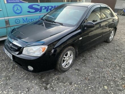 Черный Киа Черато, объемом двигателя 2 л и пробегом 240 тыс. км за 3300 $, фото 1 на Automoto.ua