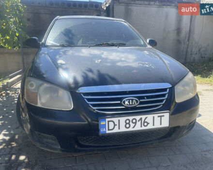 Черный Киа Черато, объемом двигателя 1.59 л и пробегом 202 тыс. км за 2999 $, фото 1 на Automoto.ua