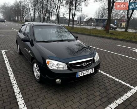 Черный Киа Черато, объемом двигателя 1.98 л и пробегом 190 тыс. км за 3850 $, фото 1 на Automoto.ua