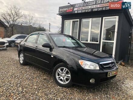 Чорний Кіа Черато, об'ємом двигуна 2 л та пробігом 177 тис. км за 4399 $, фото 1 на Automoto.ua