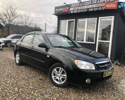 Черный Киа Черато, объемом двигателя 2 л и пробегом 177 тыс. км за 4399 $, фото 1 на Automoto.ua