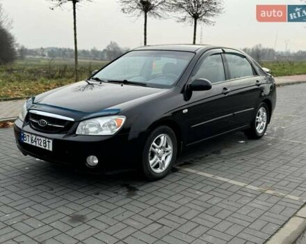 Черный Киа Черато, объемом двигателя 1.98 л и пробегом 177 тыс. км за 3950 $, фото 1 на Automoto.ua