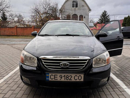 Черный Киа Черато, объемом двигателя 1.6 л и пробегом 232 тыс. км за 4300 $, фото 1 на Automoto.ua