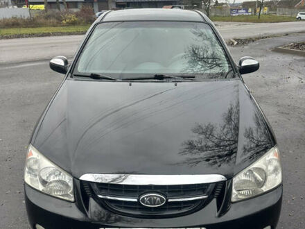 Черный Киа Черато, объемом двигателя 1.98 л и пробегом 236 тыс. км за 4100 $, фото 1 на Automoto.ua