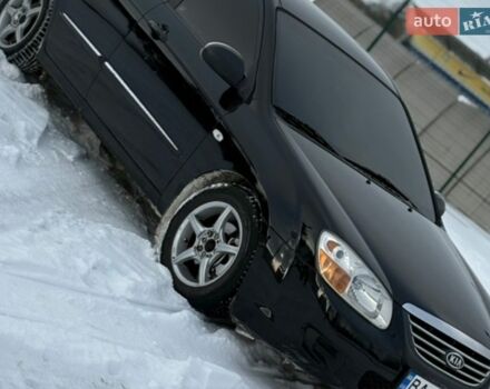 Черный Киа Черато, объемом двигателя 1.59 л и пробегом 227 тыс. км за 5100 $, фото 1 на Automoto.ua