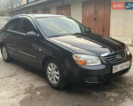 Черный Киа Черато, объемом двигателя 1.6 л и пробегом 230 тыс. км за 4950 $, фото 1 на Automoto.ua