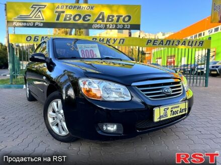 Черный Киа Черато, объемом двигателя 1.6 л и пробегом 174 тыс. км за 4550 $, фото 1 на Automoto.ua