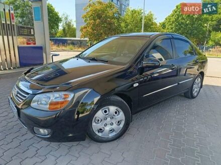 Чорний Кіа Черато, об'ємом двигуна 1.59 л та пробігом 219 тис. км за 4600 $, фото 1 на Automoto.ua