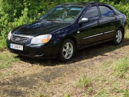 Черный Киа Черато, объемом двигателя 1.6 л и пробегом 278 тыс. км за 4350 $, фото 1 на Automoto.ua