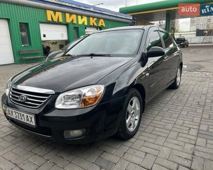 Черный Киа Черато, объемом двигателя 1.6 л и пробегом 180 тыс. км за 4900 $, фото 1 на Automoto.ua