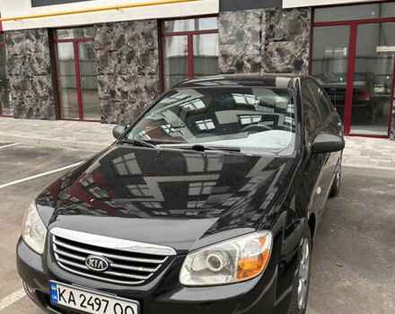 Черный Киа Черато, объемом двигателя 1.6 л и пробегом 206 тыс. км за 4500 $, фото 1 на Automoto.ua