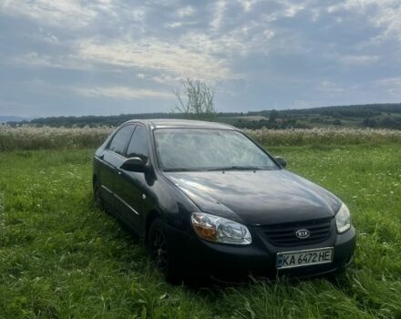Чорний Кіа Черато, об'ємом двигуна 1.6 л та пробігом 200 тис. км за 1650 $, фото 1 на Automoto.ua