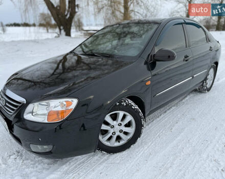 Черный Киа Черато, объемом двигателя 1.6 л и пробегом 230 тыс. км за 4649 $, фото 1 на Automoto.ua