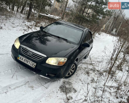 Черный Киа Черато, объемом двигателя 1.59 л и пробегом 243 тыс. км за 2900 $, фото 1 на Automoto.ua