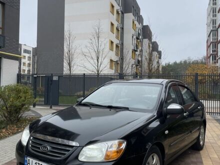 Черный Киа Черато, объемом двигателя 1.6 л и пробегом 256 тыс. км за 4200 $, фото 1 на Automoto.ua
