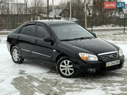 Чорний Кіа Черато, об'ємом двигуна 2 л та пробігом 258 тис. км за 2900 $, фото 1 на Automoto.ua