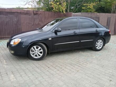 Черный Киа Черато, объемом двигателя 2 л и пробегом 250 тыс. км за 3700 $, фото 1 на Automoto.ua