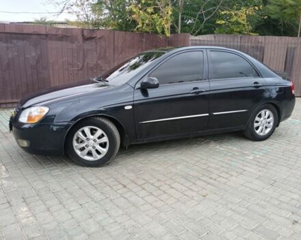 Черный Киа Черато, объемом двигателя 2 л и пробегом 250 тыс. км за 3700 $, фото 1 на Automoto.ua