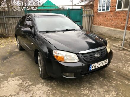 Черный Киа Черато, объемом двигателя 1.6 л и пробегом 240 тыс. км за 3300 $, фото 1 на Automoto.ua