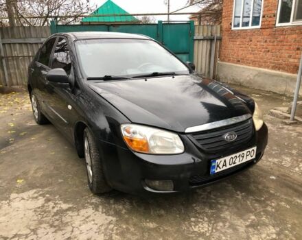 Черный Киа Черато, объемом двигателя 1.6 л и пробегом 240 тыс. км за 3300 $, фото 1 на Automoto.ua