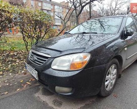 Черный Киа Черато, объемом двигателя 1.59 л и пробегом 349 тыс. км за 4000 $, фото 1 на Automoto.ua