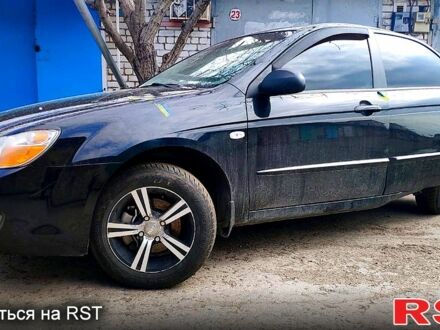 Черный Киа Черато, объемом двигателя 1.6 л и пробегом 160 тыс. км за 2500 $, фото 1 на Automoto.ua