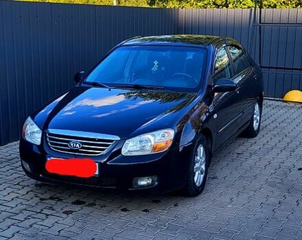 Черный Киа Черато, объемом двигателя 2 л и пробегом 250 тыс. км за 4600 $, фото 1 на Automoto.ua