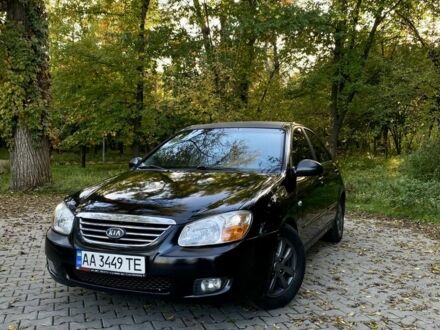 Черный Киа Черато, объемом двигателя 2 л и пробегом 302 тыс. км за 4600 $, фото 1 на Automoto.ua
