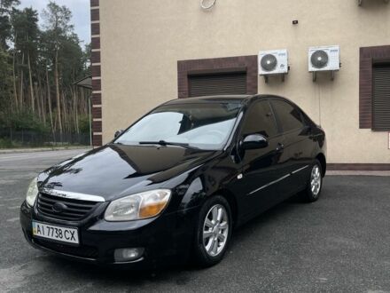 Черный Киа Черато, объемом двигателя 1.6 л и пробегом 207 тыс. км за 3500 $, фото 1 на Automoto.ua