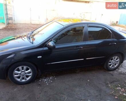 Черный Киа Черато, объемом двигателя 1.6 л и пробегом 228 тыс. км за 4300 $, фото 1 на Automoto.ua