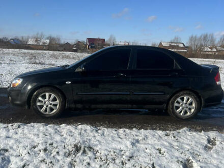 Черный Киа Черато, объемом двигателя 1.58 л и пробегом 355 тыс. км за 3500 $, фото 1 на Automoto.ua