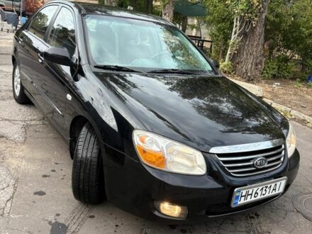 Черный Киа Черато, объемом двигателя 2 л и пробегом 250 тыс. км за 5000 $, фото 1 на Automoto.ua