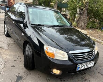 Черный Киа Черато, объемом двигателя 2 л и пробегом 250 тыс. км за 5000 $, фото 1 на Automoto.ua