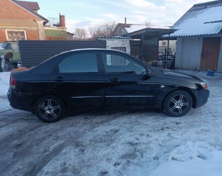 Чорний Кіа Черато, об'ємом двигуна 1.6 л та пробігом 360 тис. км за 2409 $, фото 1 на Automoto.ua